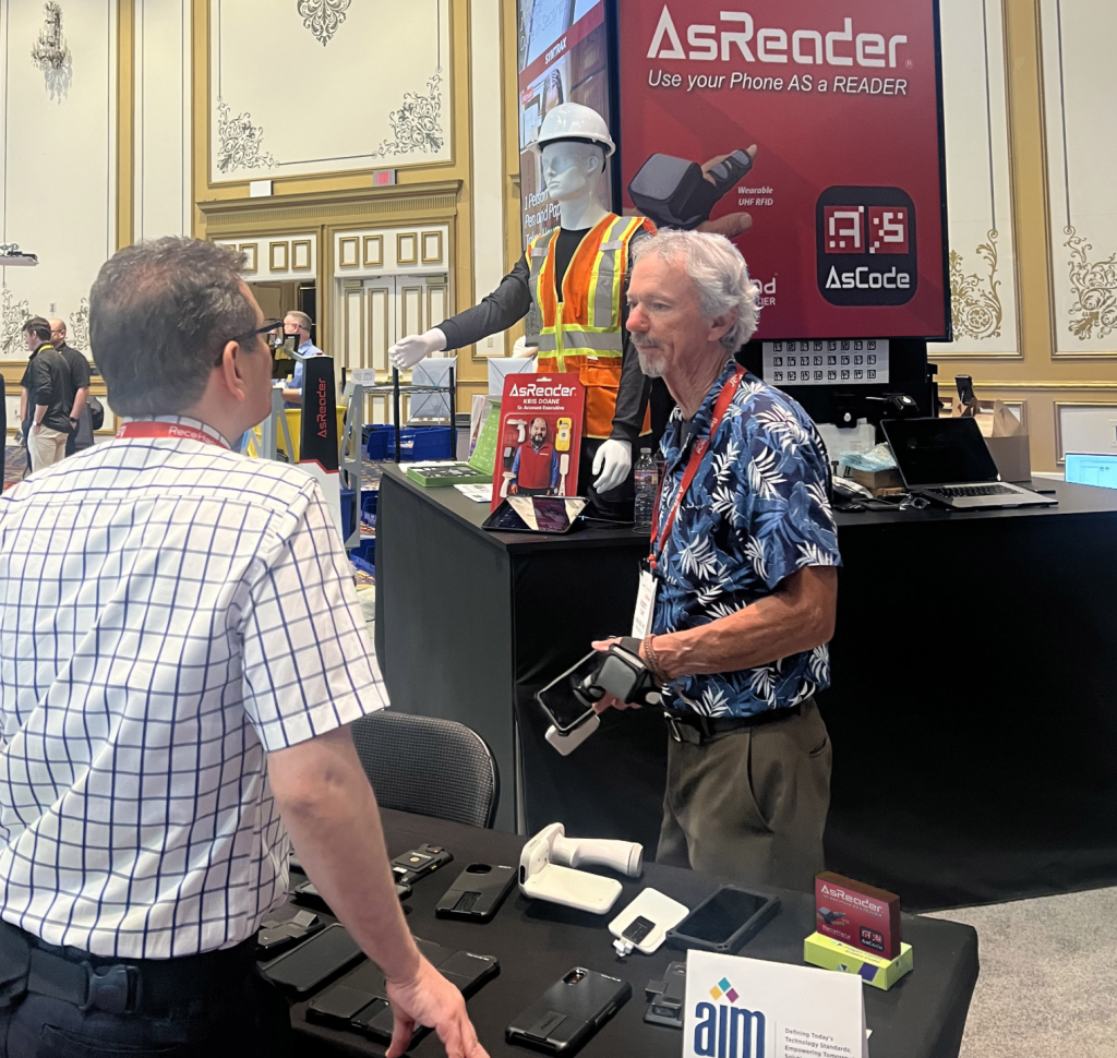 Man at tradeshow for AsReader